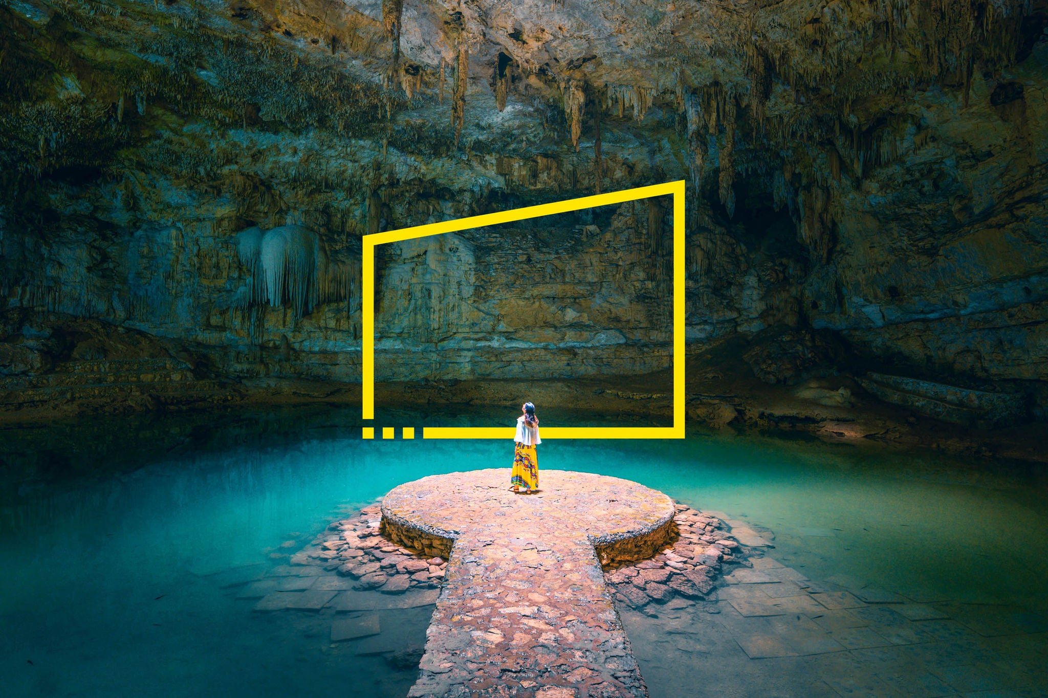 Woman standing alone in a cenote in mexico