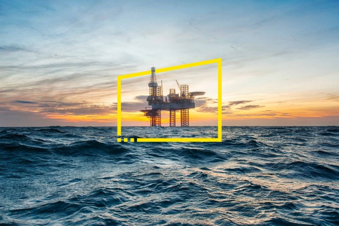Offshore drilling rig at sunset