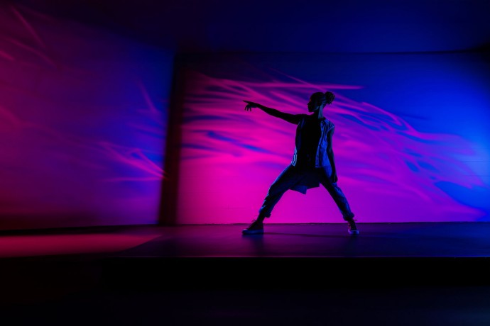 silhouette of a hip hop dancer in a dynamic pose