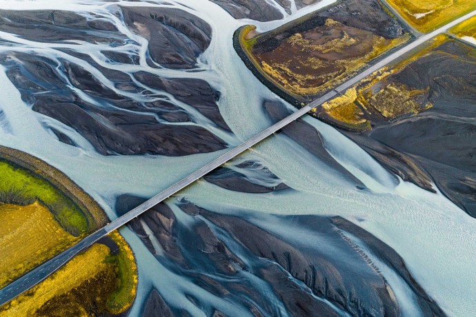 Aerial view of bridge over braided river