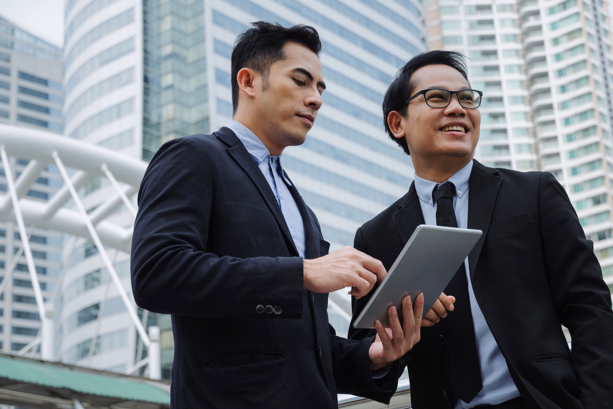 two business young asian business men