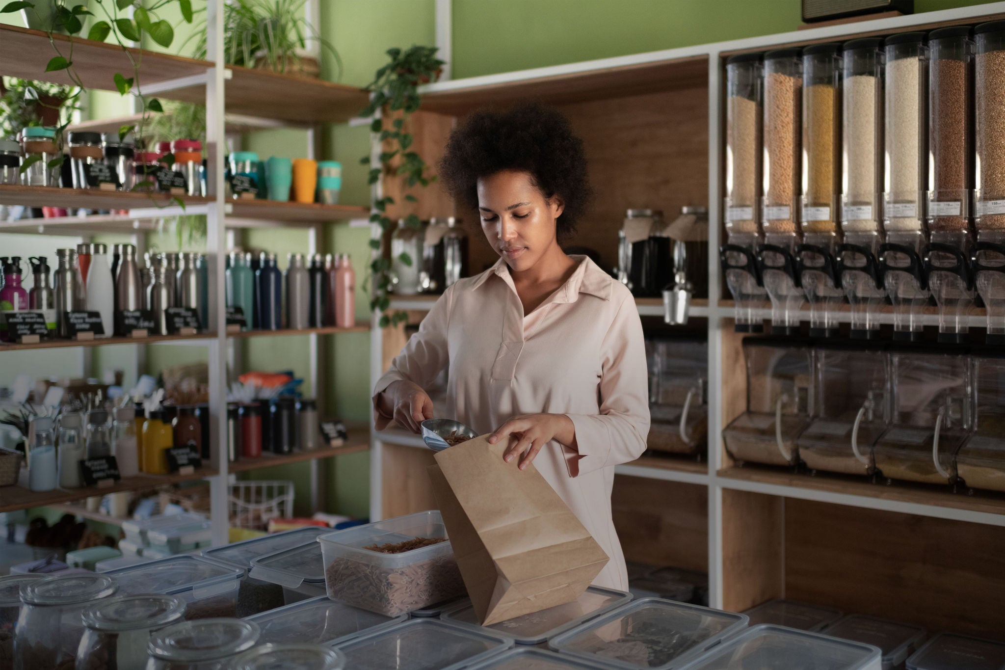 Young woman looking at store.