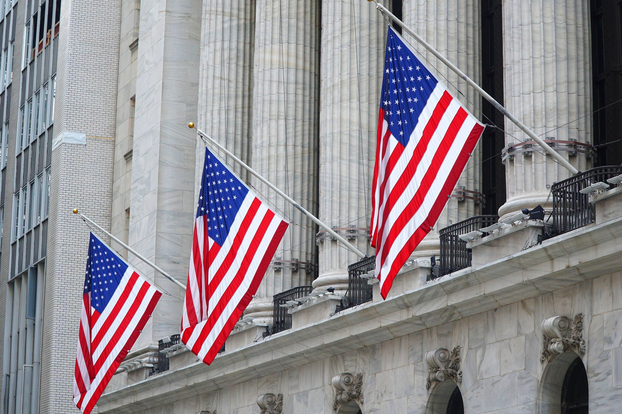 USA flag hanging in front of the government building