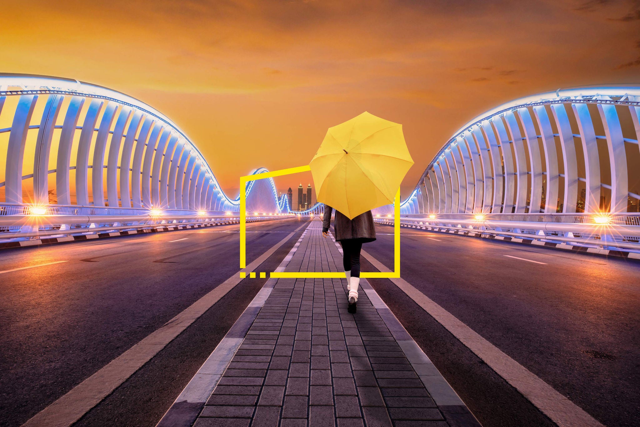 ey-women-with-umbrella-walking-across-bridge-static