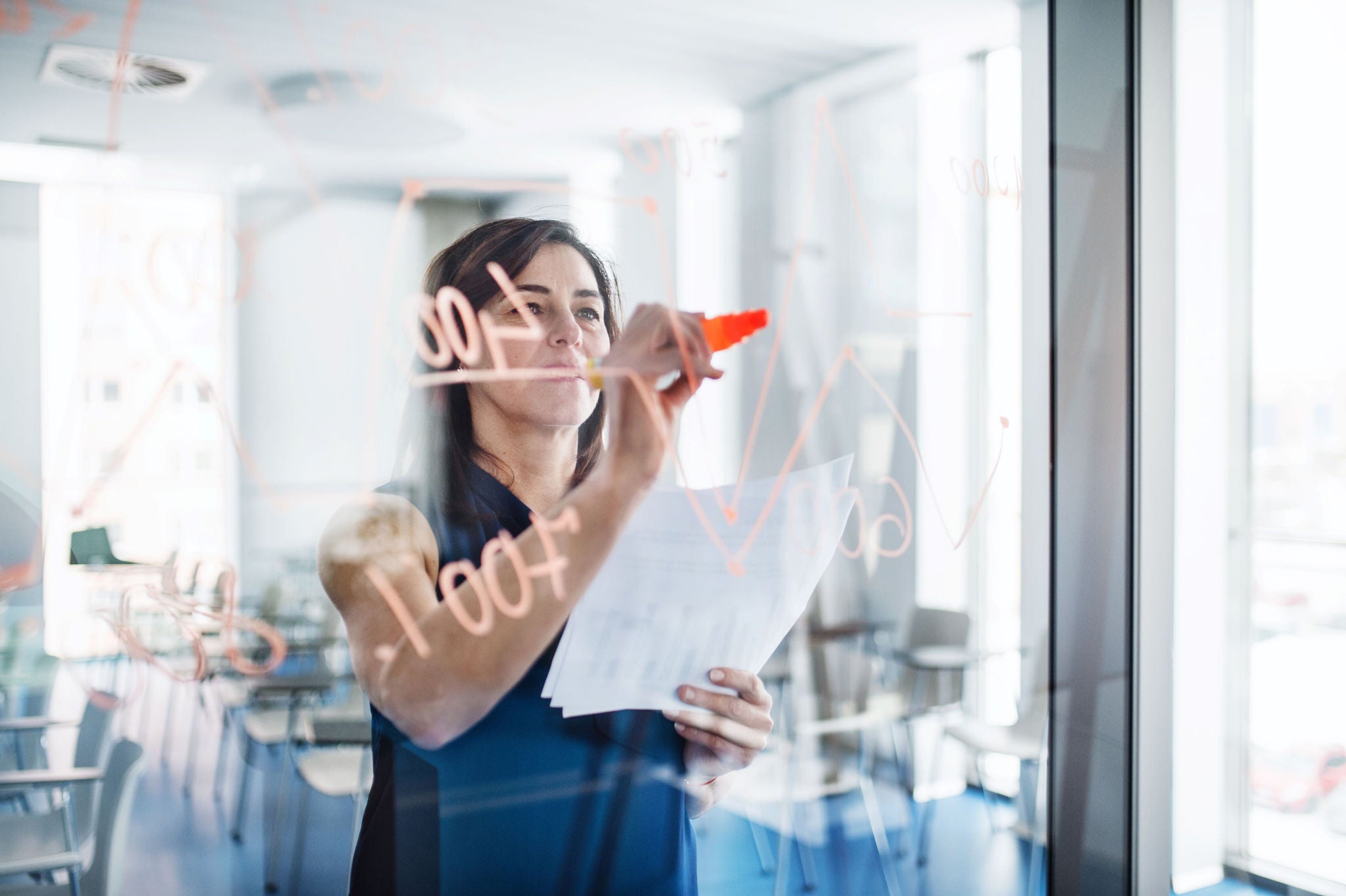 Girl writing in board