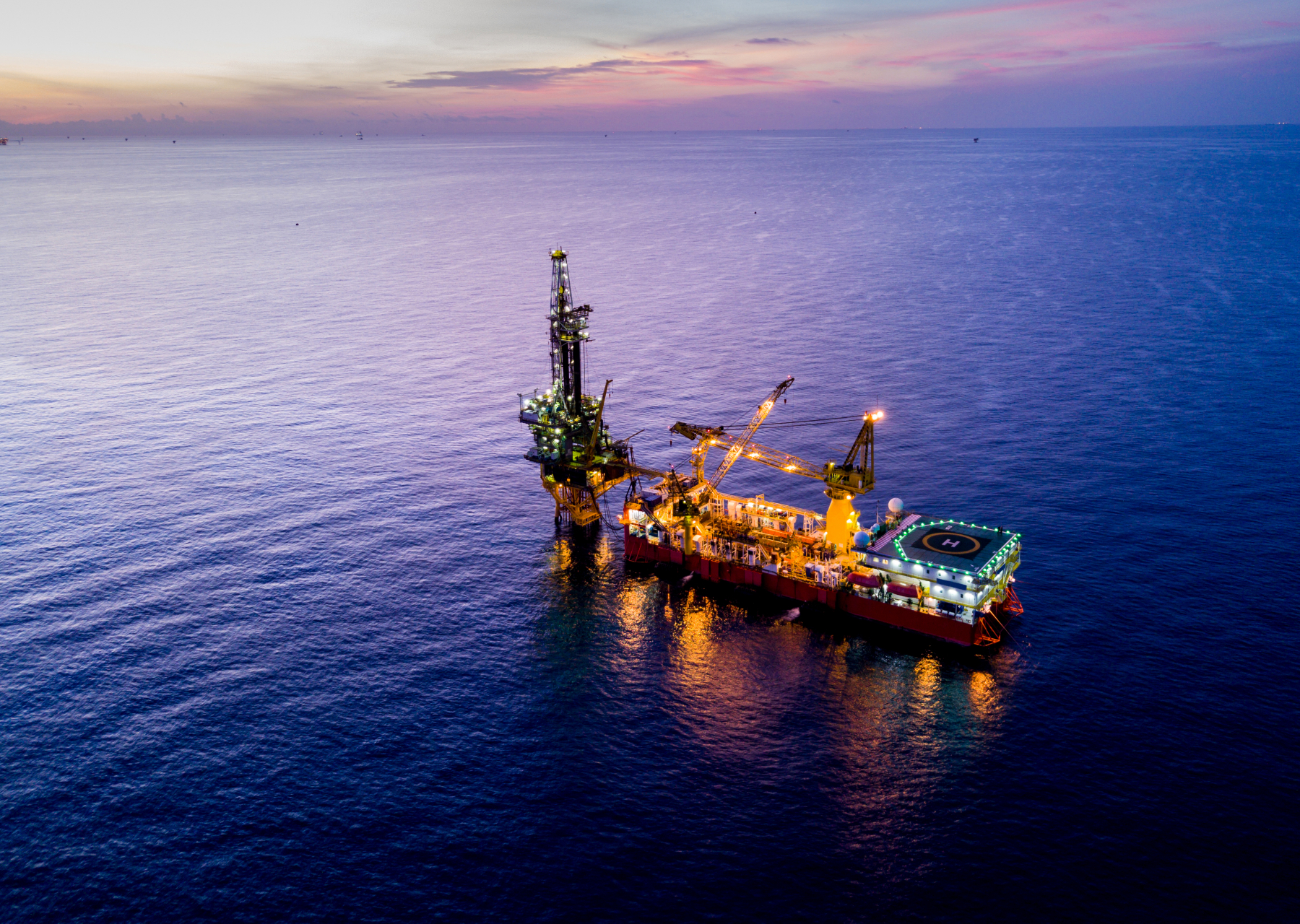 Aerial view of tender drilling oil rig