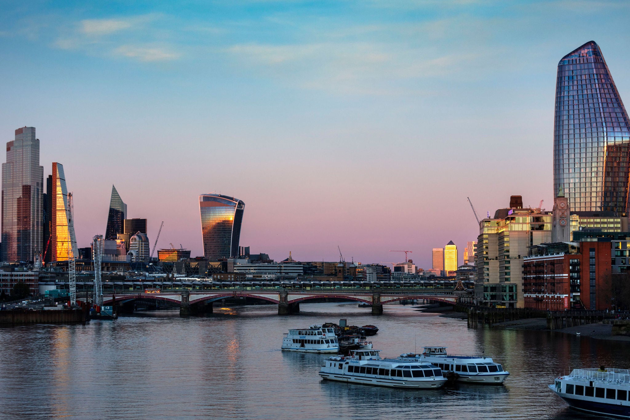 The evening light on the skyline of the building on the river