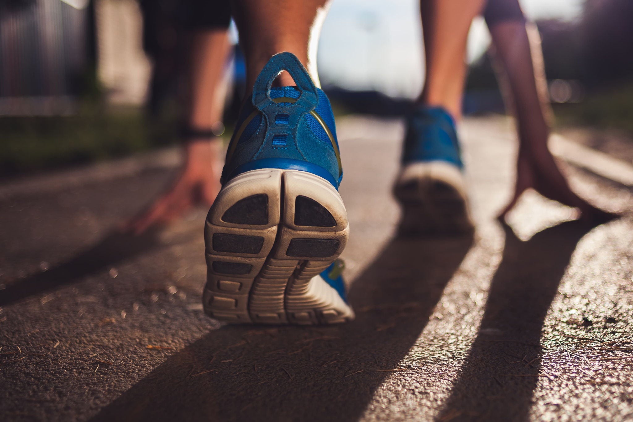 a runner is wearing running shoe