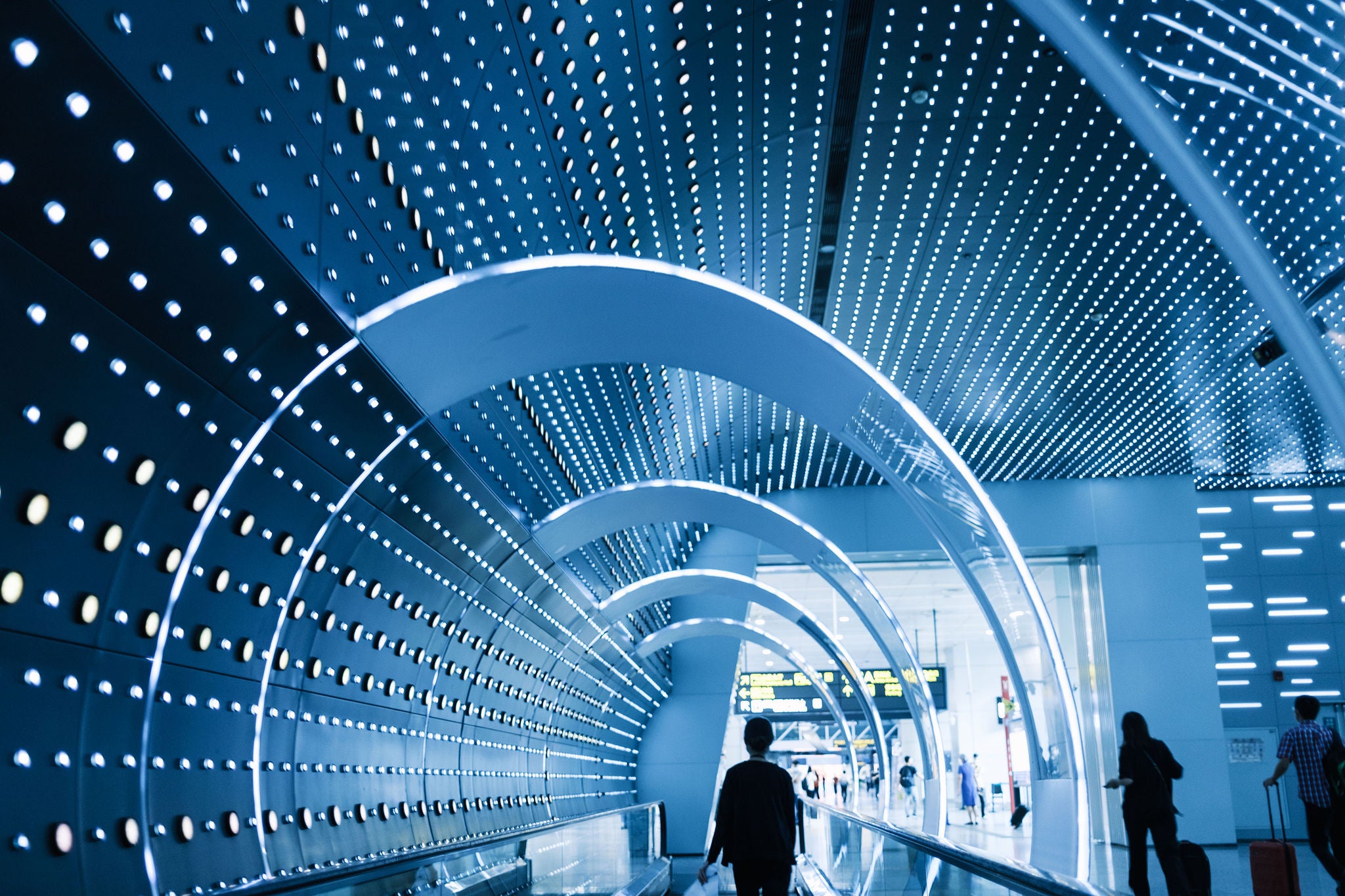 defocus business men walking in the virtual tunnel