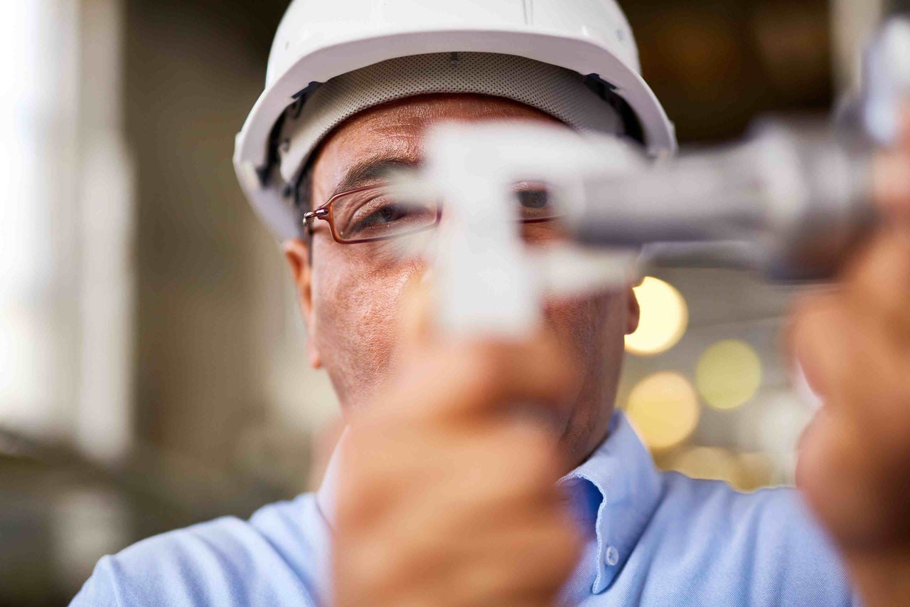 Man performing civil experiment