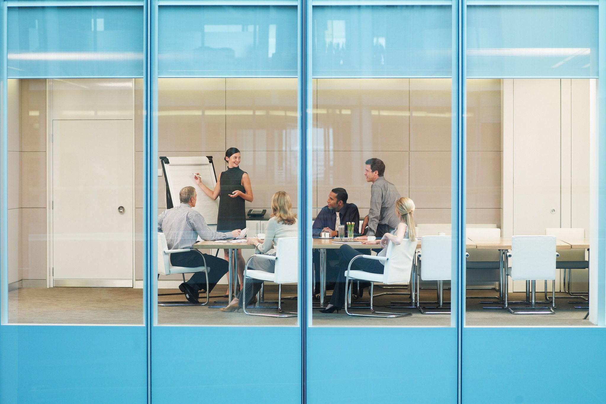 Businesspeople having meeting in conference room 