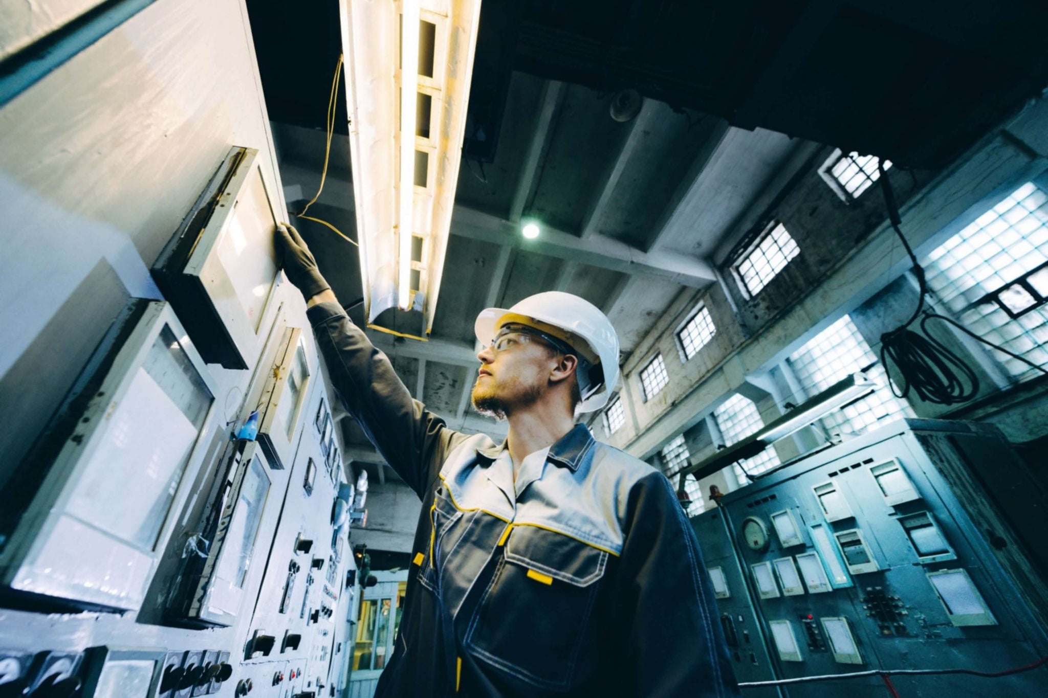 man working on power grid