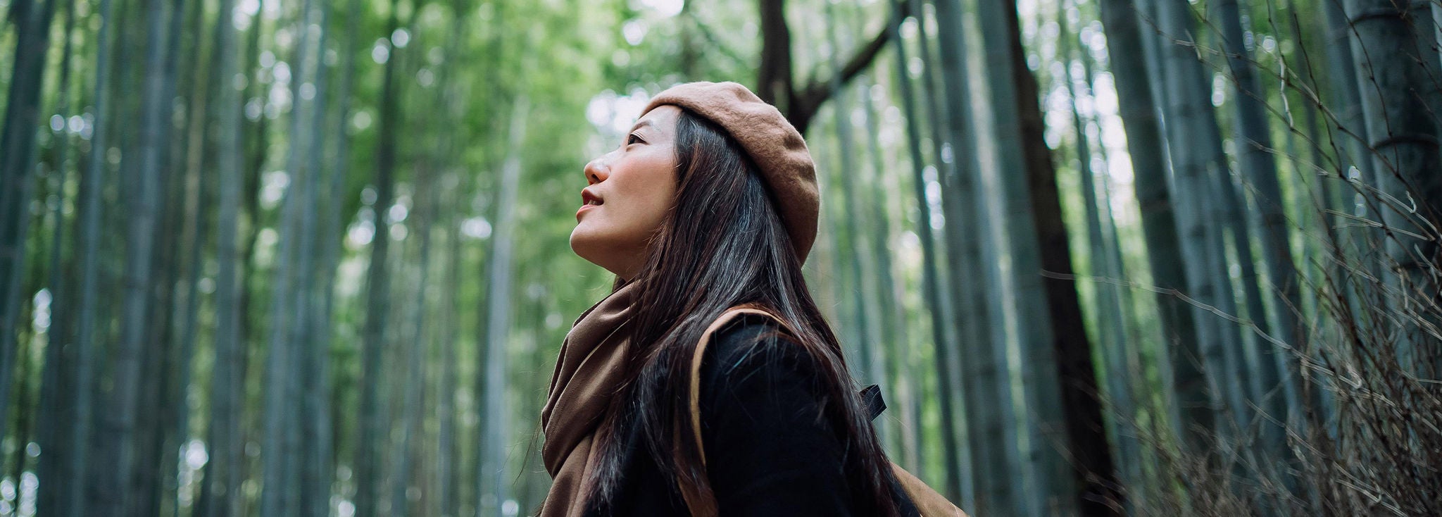 ey-female-backpacker-enjoying-nature