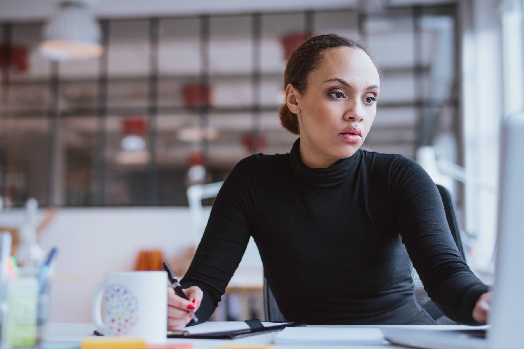 ey-young-woman-working-business-assignment