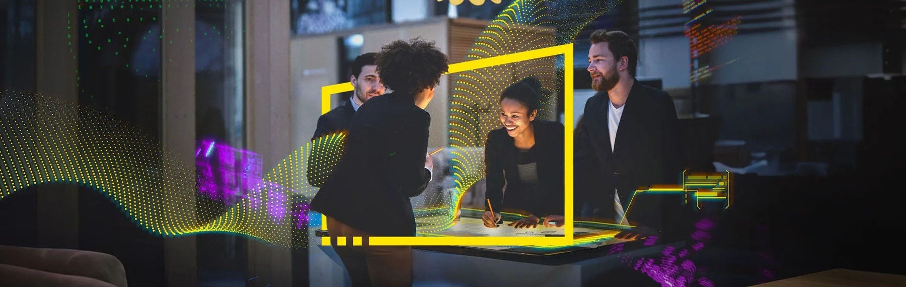 Business team working late at a standing desk in a modern office building