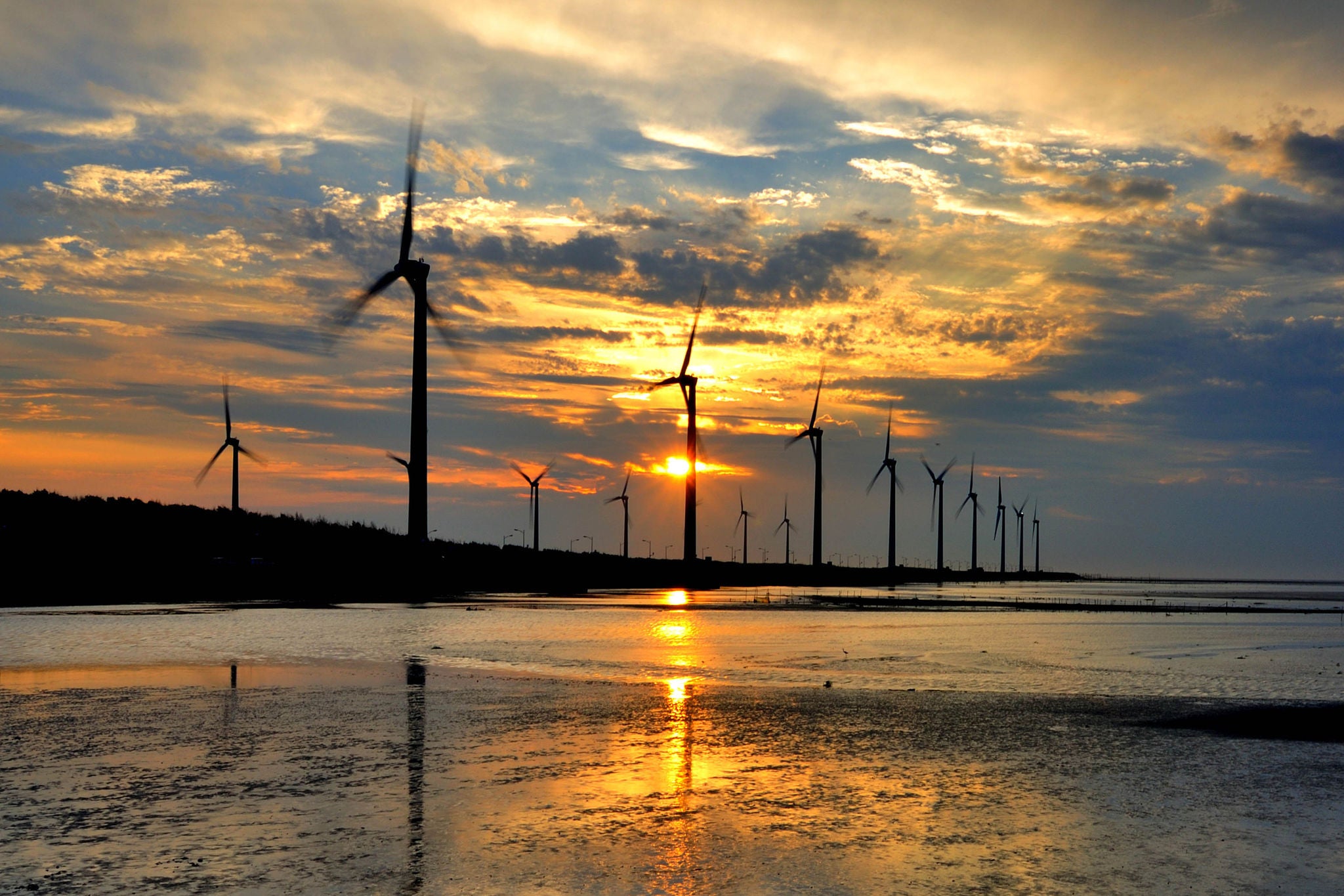 ey-wind-turbines-against-sunset