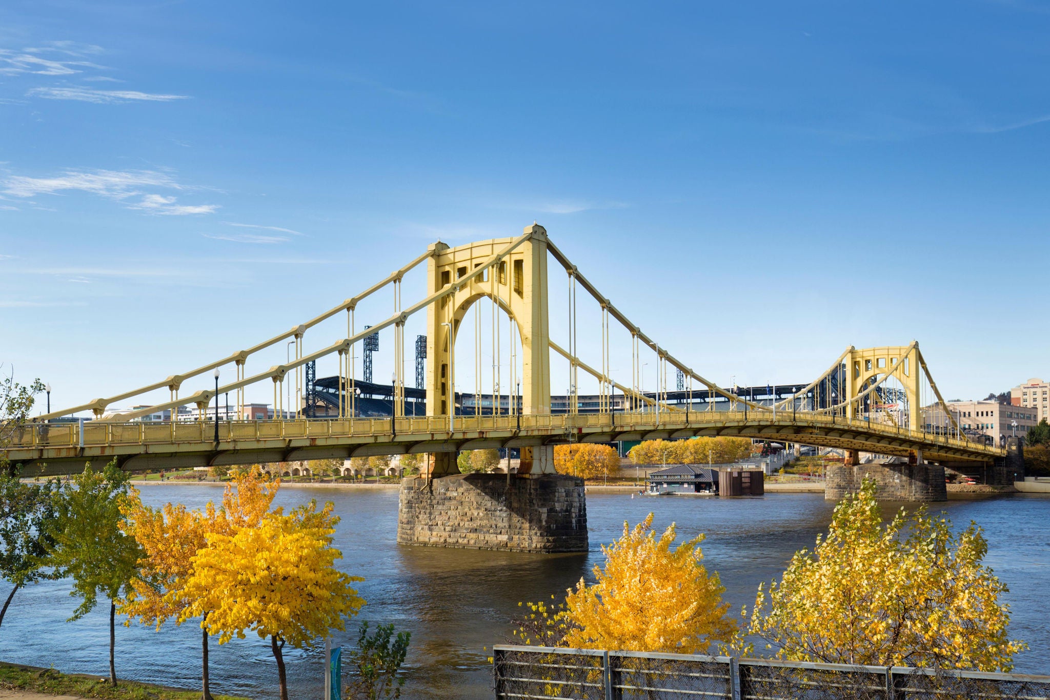 View of the Roberto Clemente Bridge over the Allegheny River in Pittsburgh, Pennsylvania, in autumn.