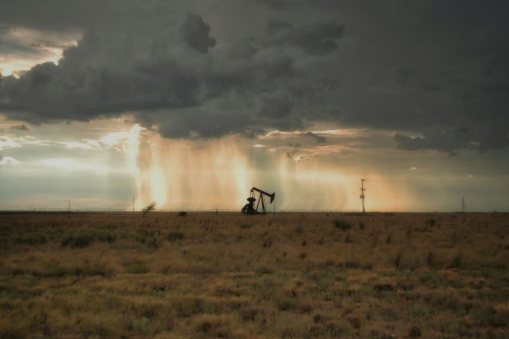 Mid distance view of oil well on field