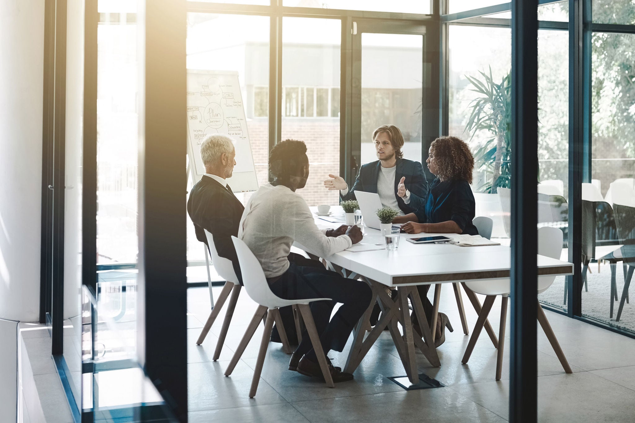 Shot of a group of businesspeople having a boardroom meeting in an office