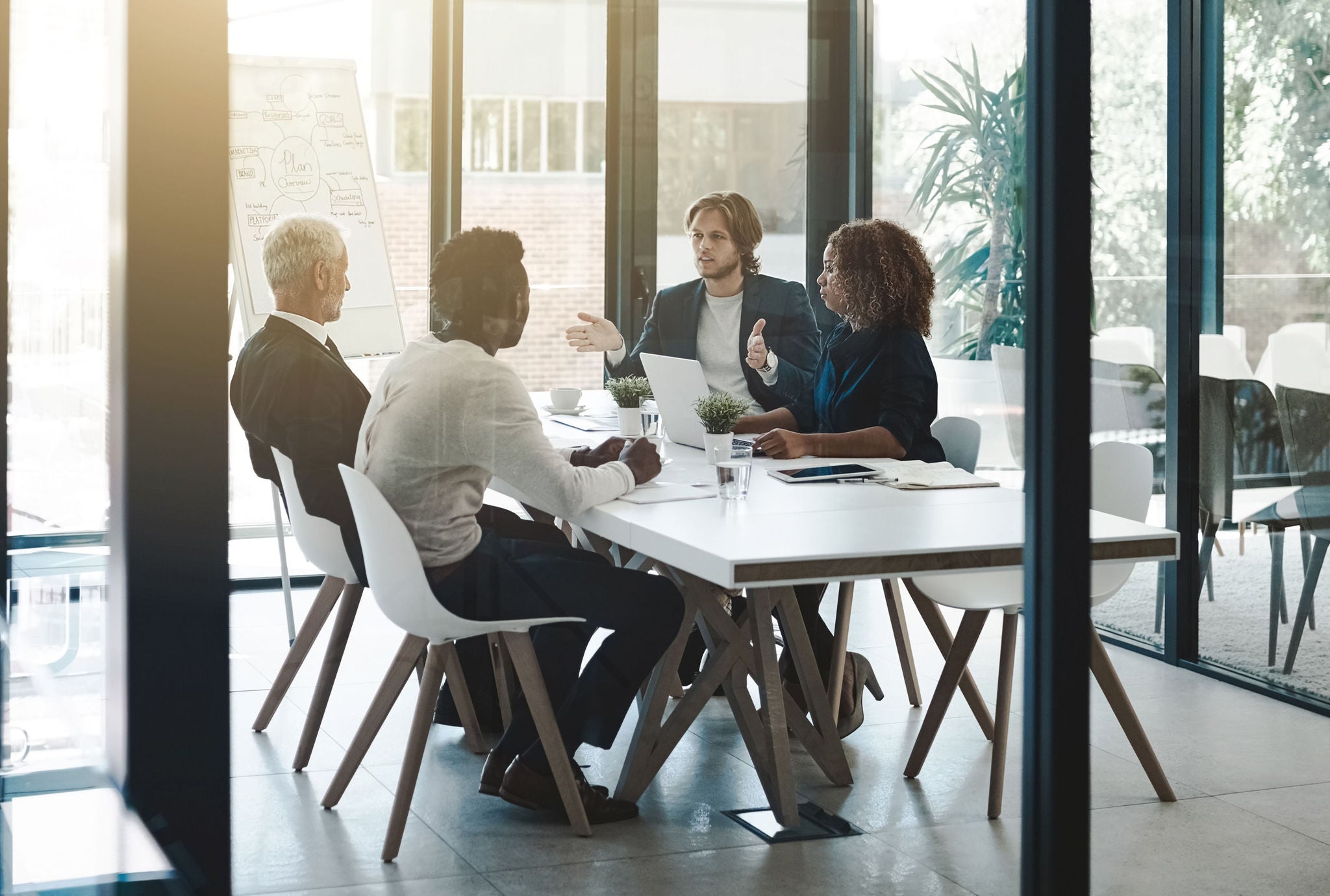 Shot of a group of businesspeople having a boardroom meeting in an office