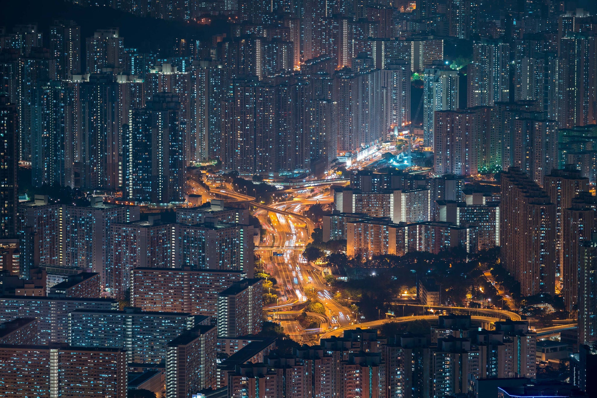 The city traffic at night in the busy asian city of Hong Kong