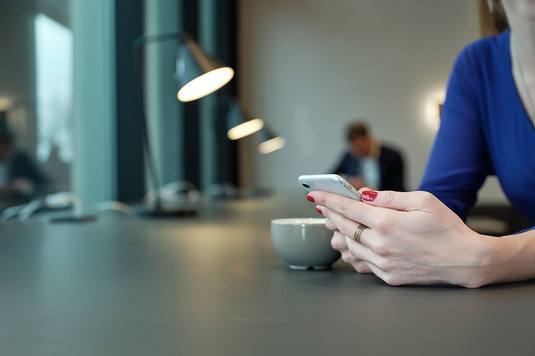 A lady is using mobile