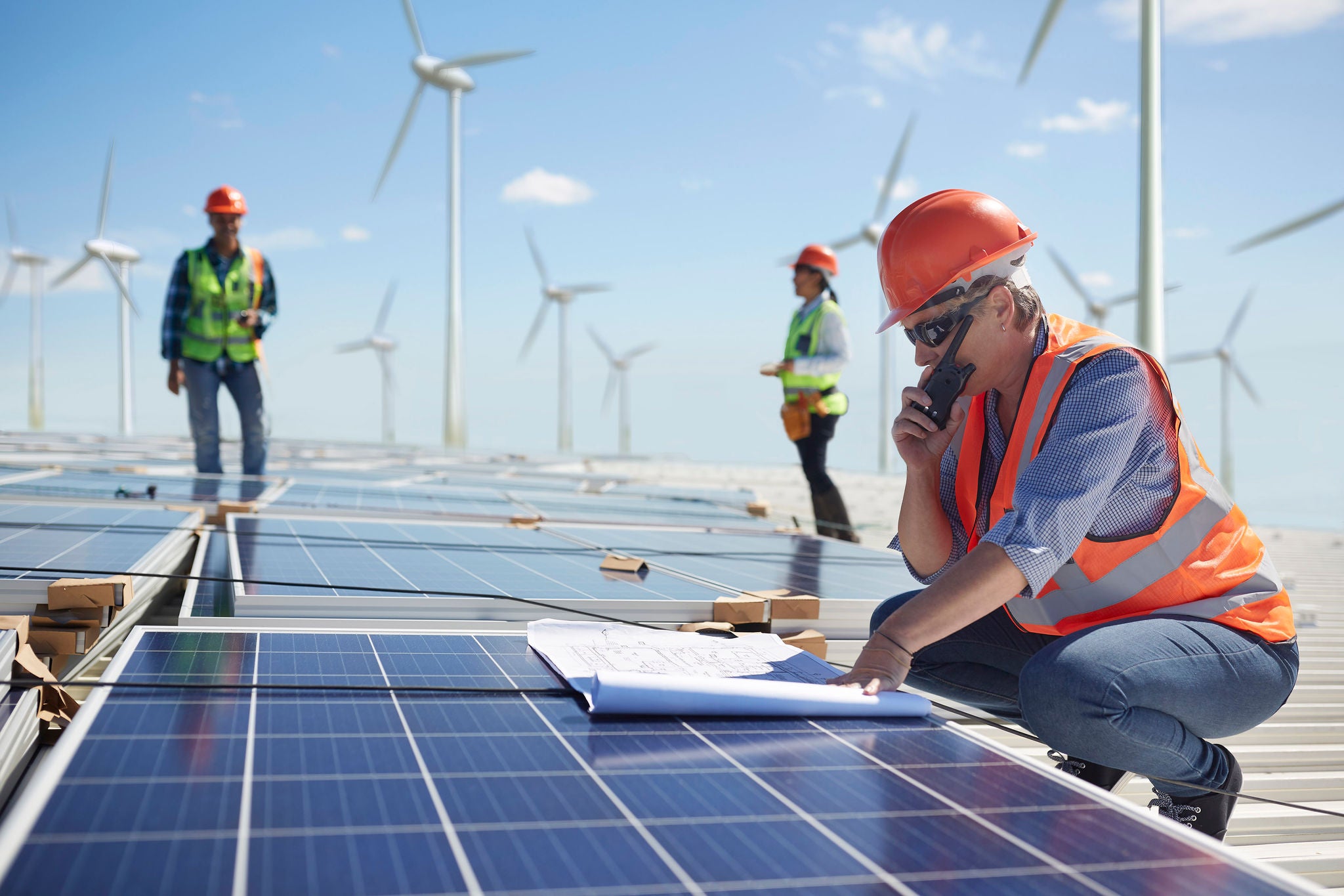 Engineer with walkie-talkie and blueprint at solar panel at sunny power plant

Image downloaded by Charlie Brewer at 15:19 on the 15/02/19