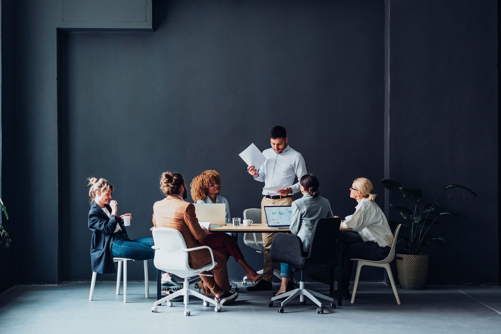 Group Of Businesspeople Having a Meeting At Their Company