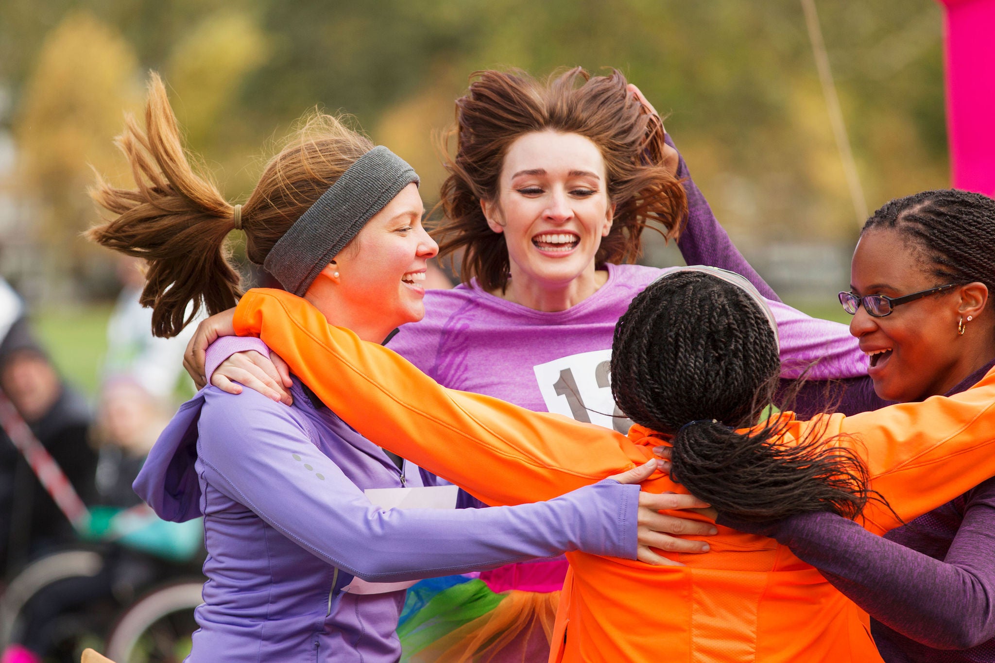 EY  Women celebrating after running race