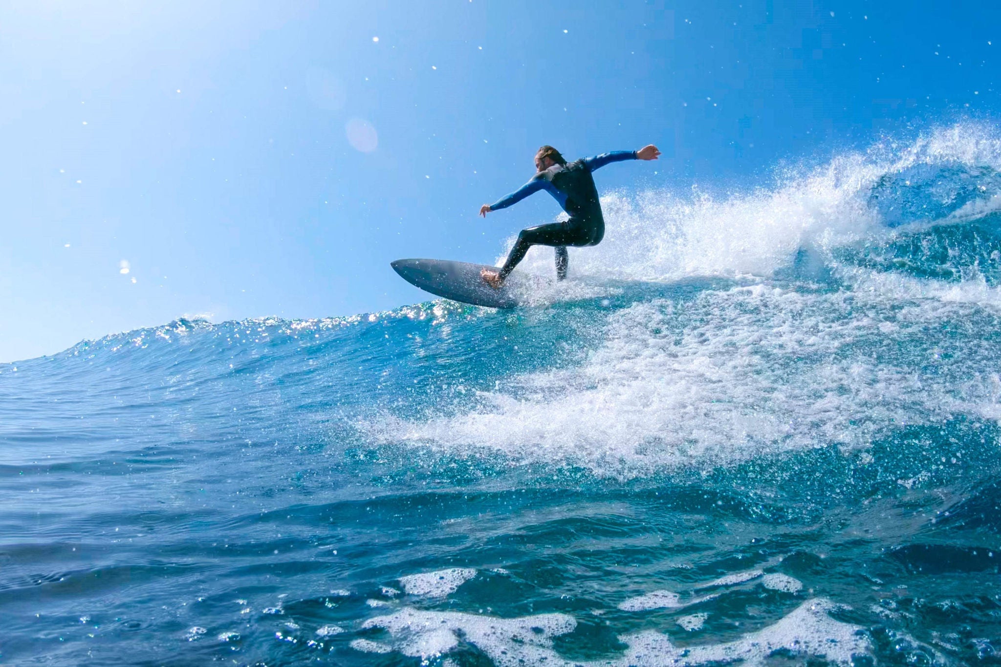 man-surfing-in-an-ocean