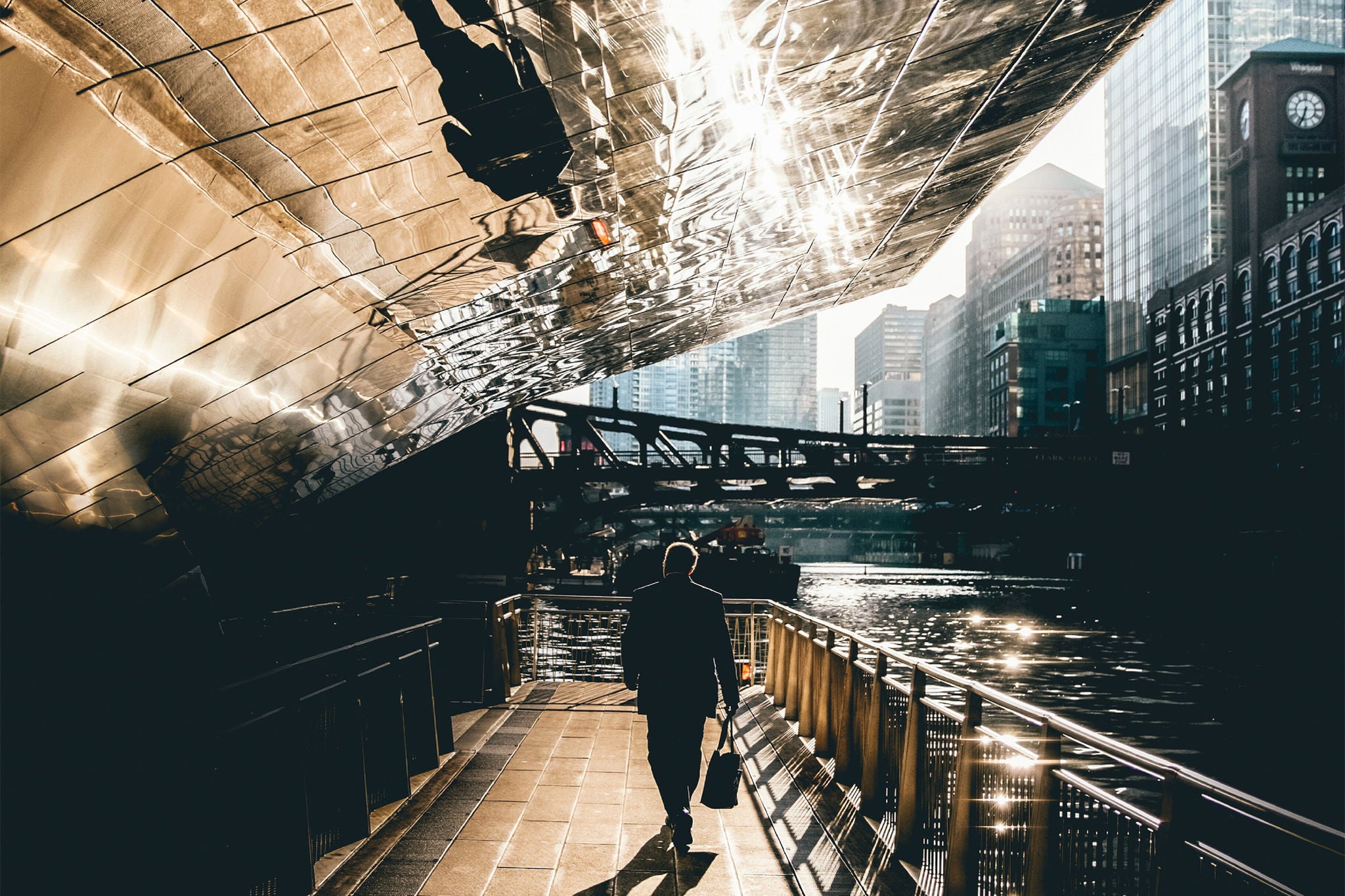 Man walking on a bridge