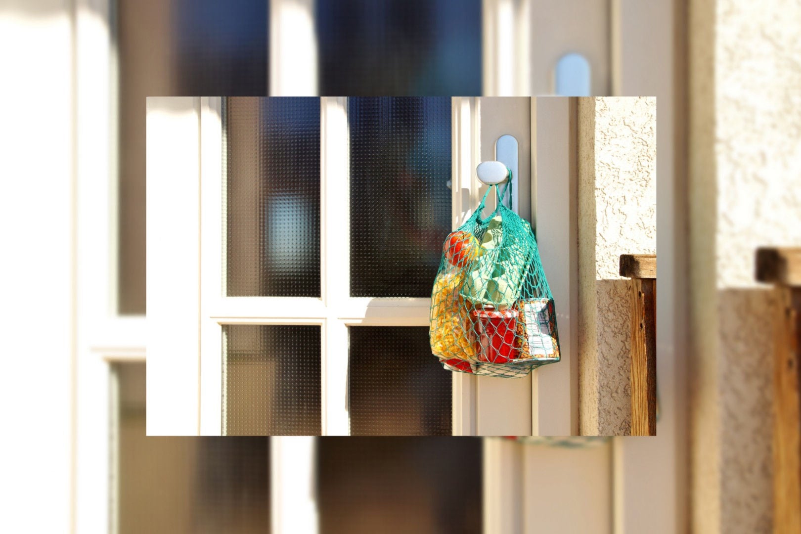 toy handing on window