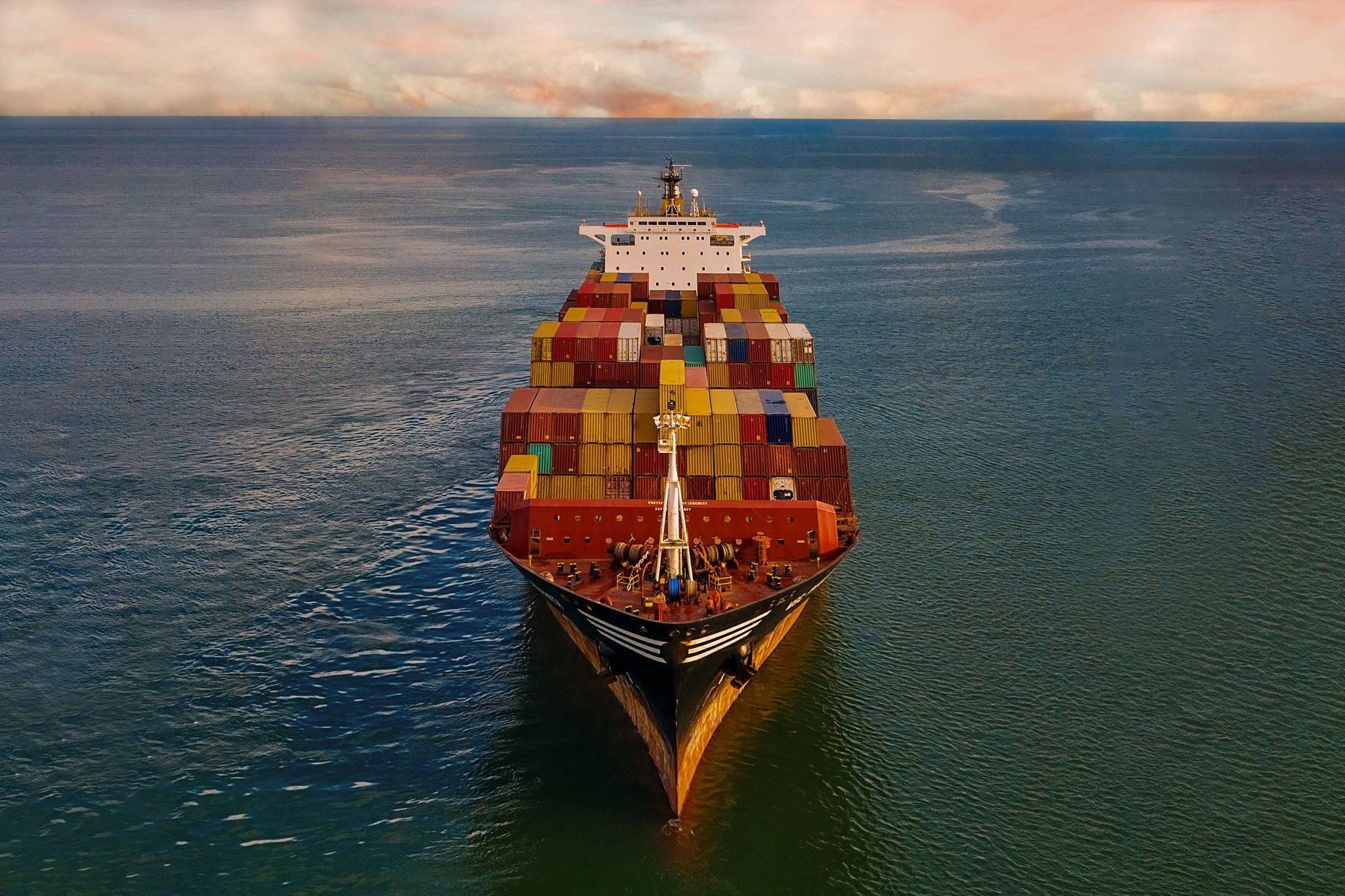 Aerial view of Container freight ship in transit