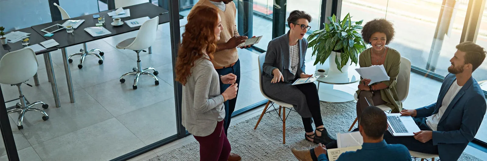 Group of creatives having a meeting in a modern office