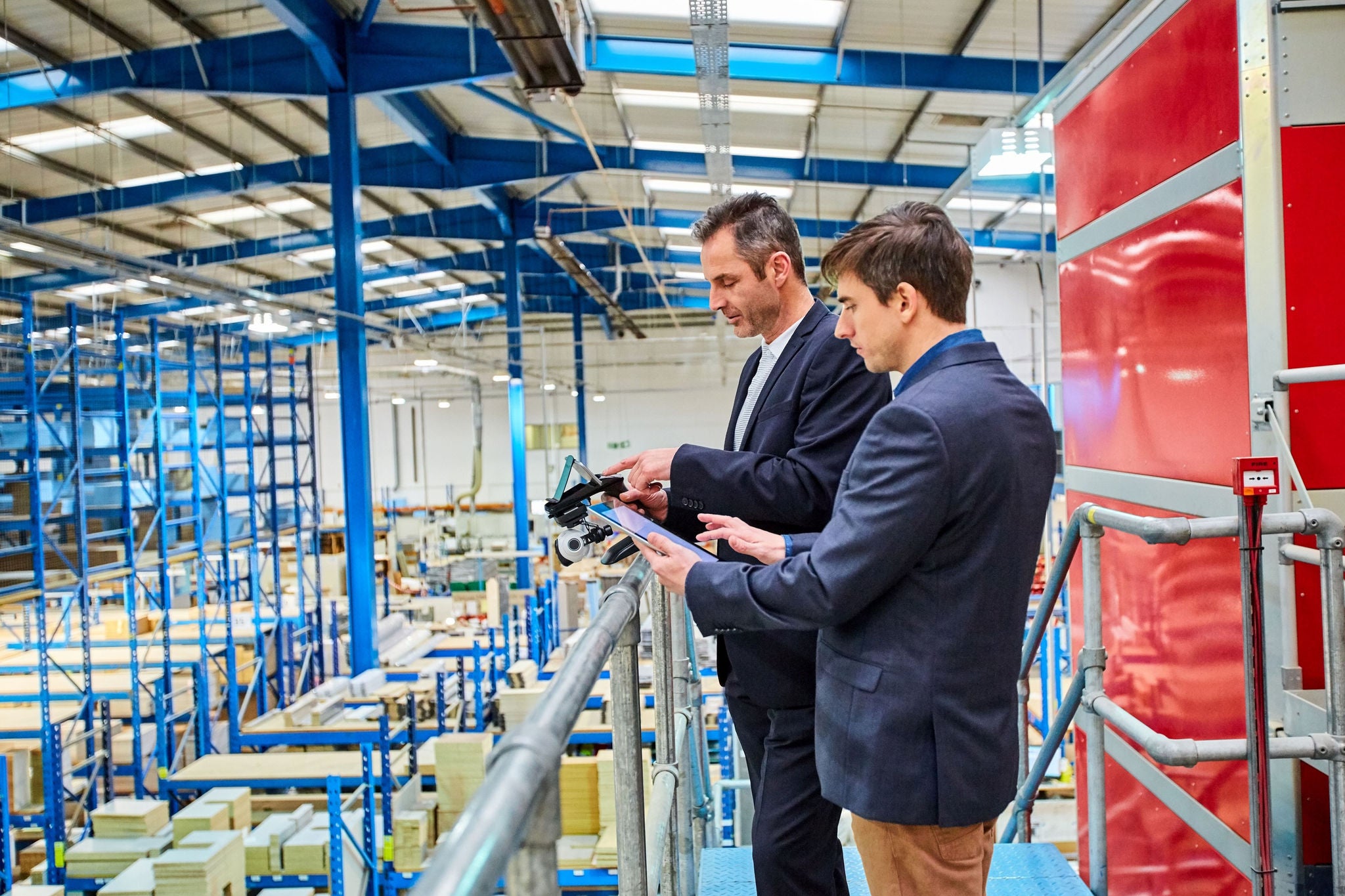 Two members checking ware house