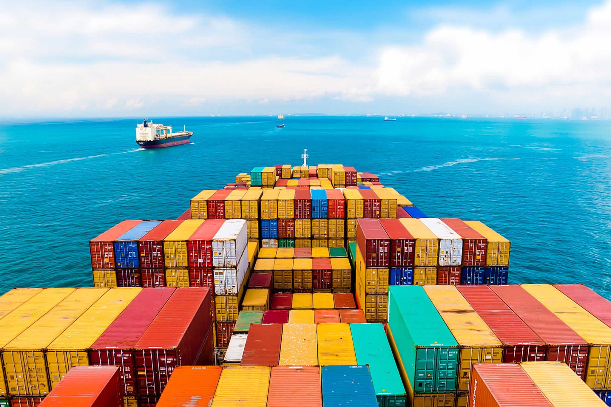 Cargo ships entering one of the busiest ports in the world, Singapore.