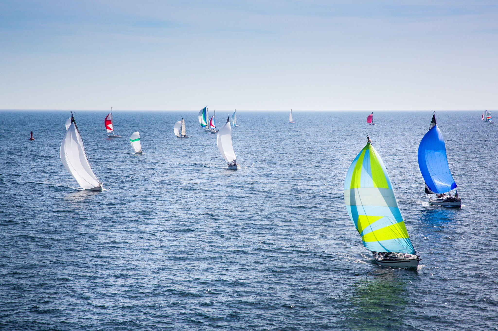 Sailboats Racing in the open ocean at a regatta