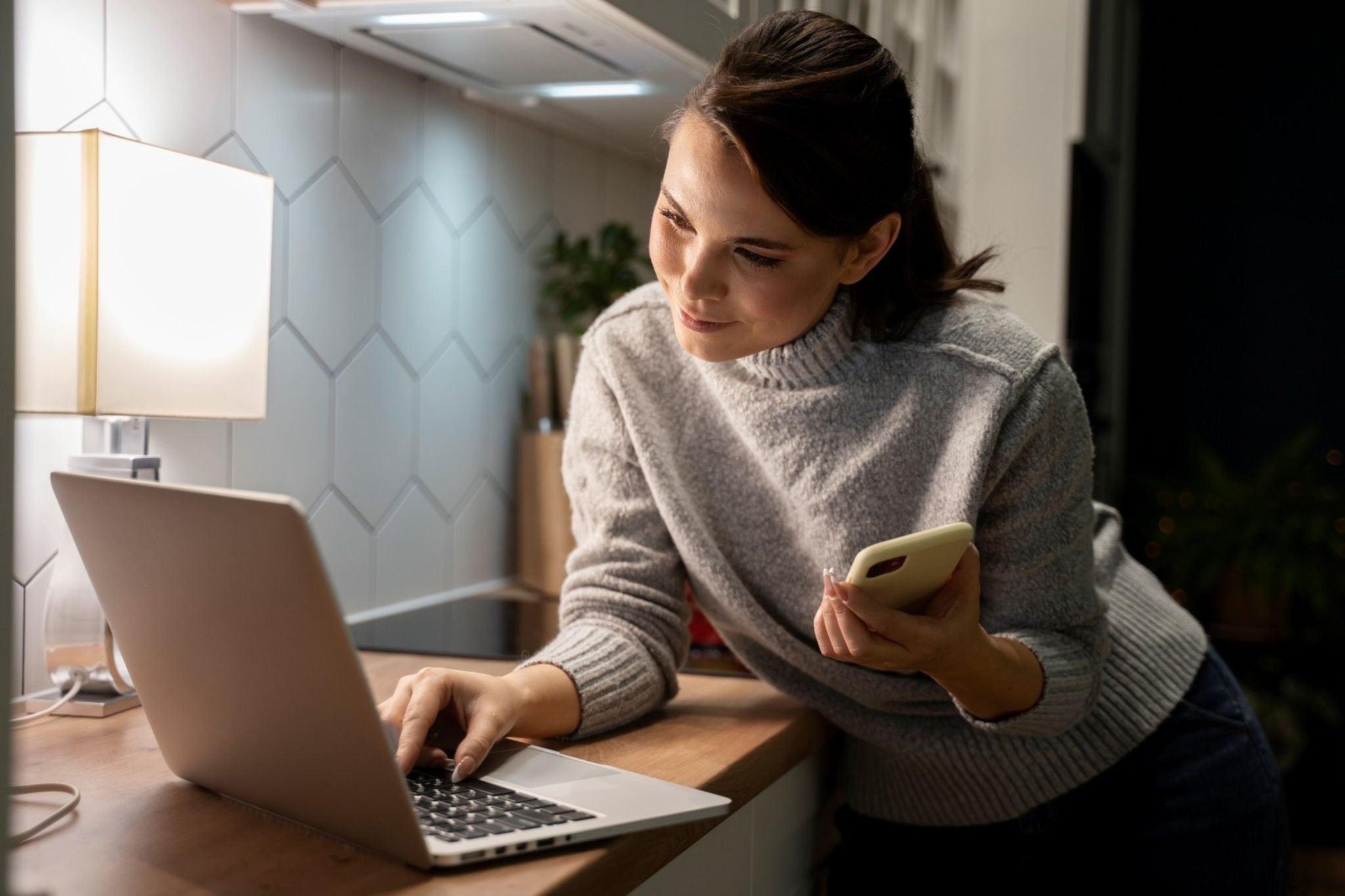 Woman using computer home