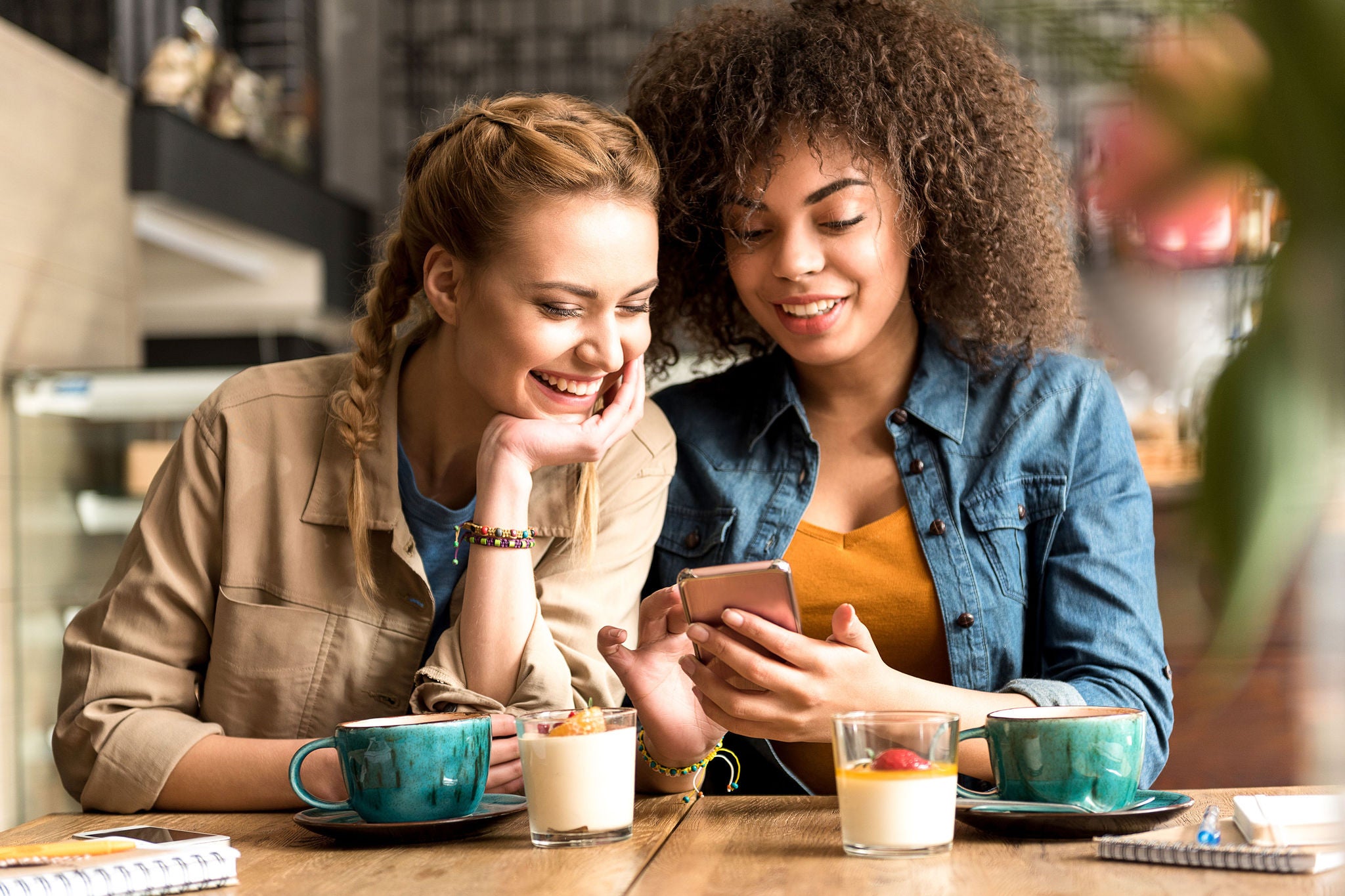 Ey smiling woman telling with beaming female