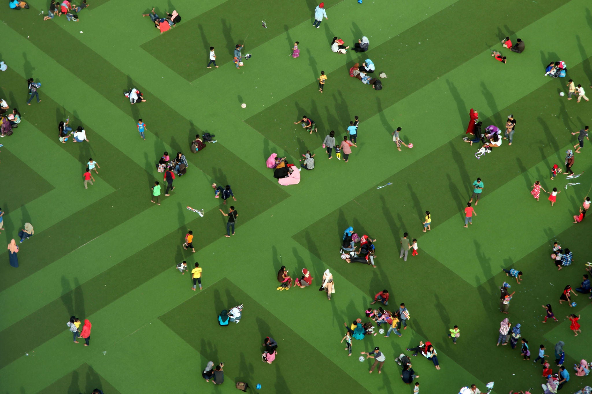 high angle view of families on green lawn