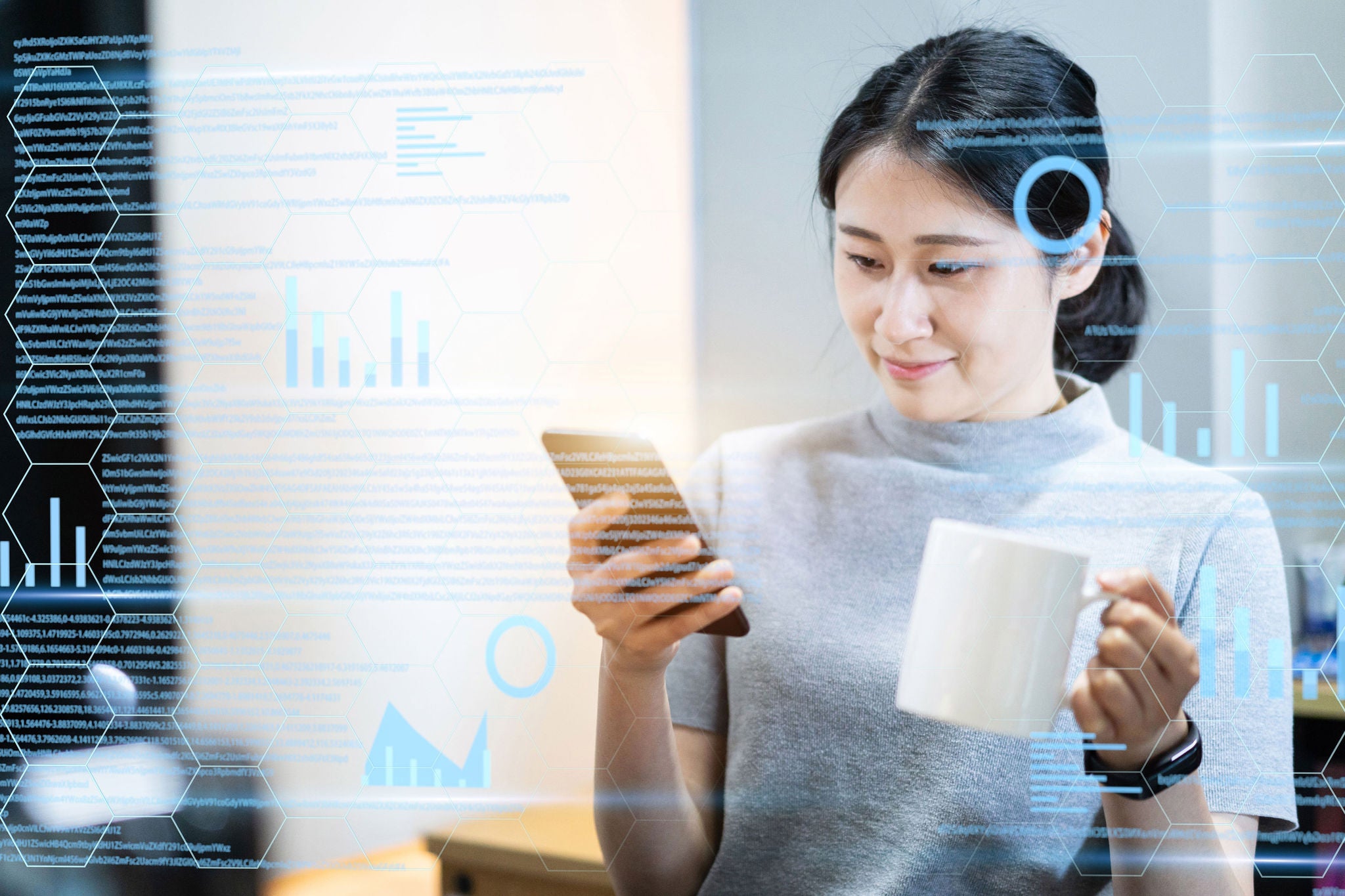 Businesswoman works with high technology in modern office