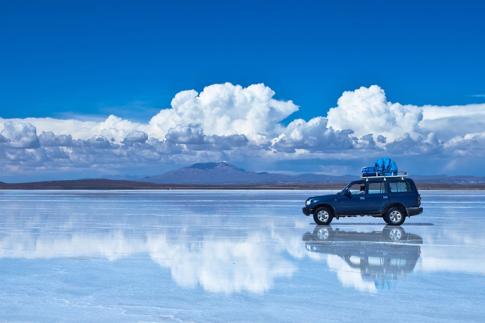 Reflection of car in Salar de Uyuni(Uyuni Salt Flat), Bolivia