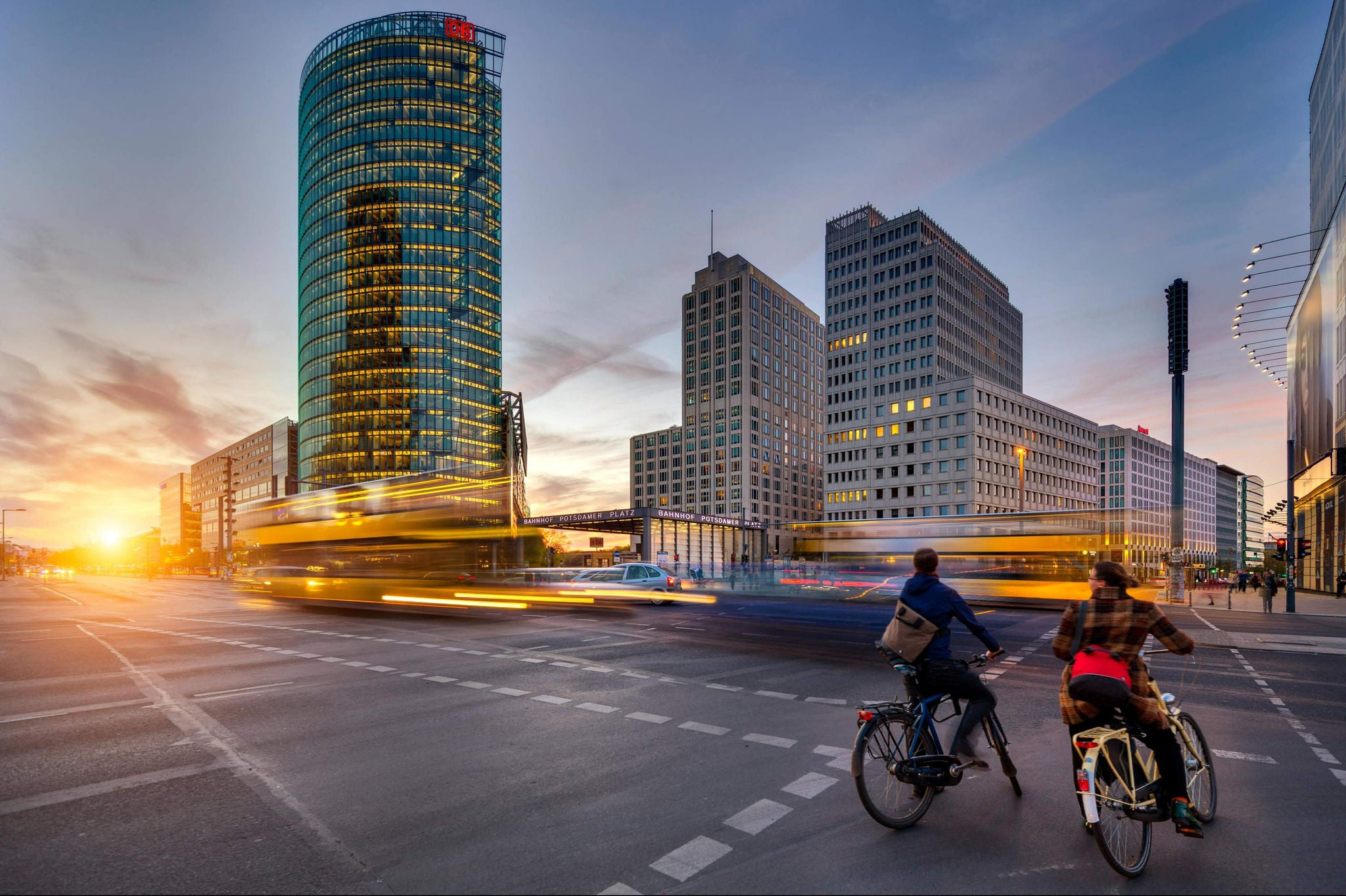 Couple riding bicycle in a street