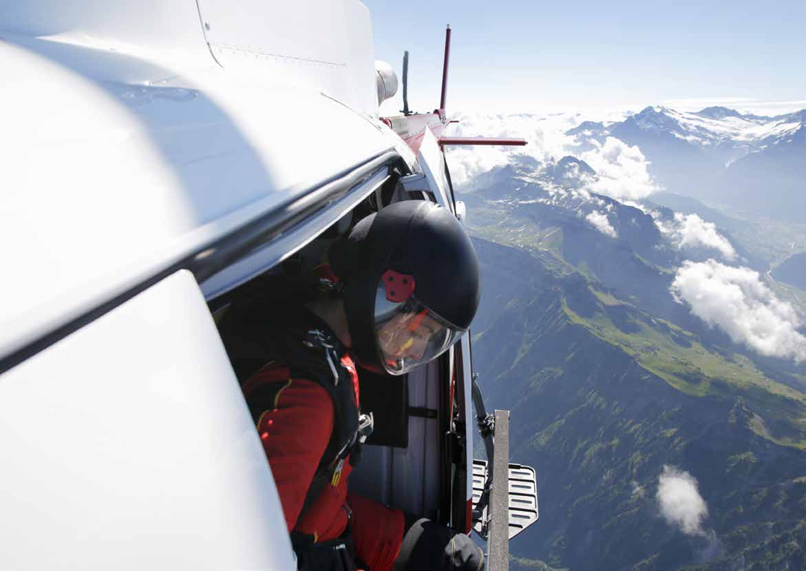 A man seeing the ground from the flying flight