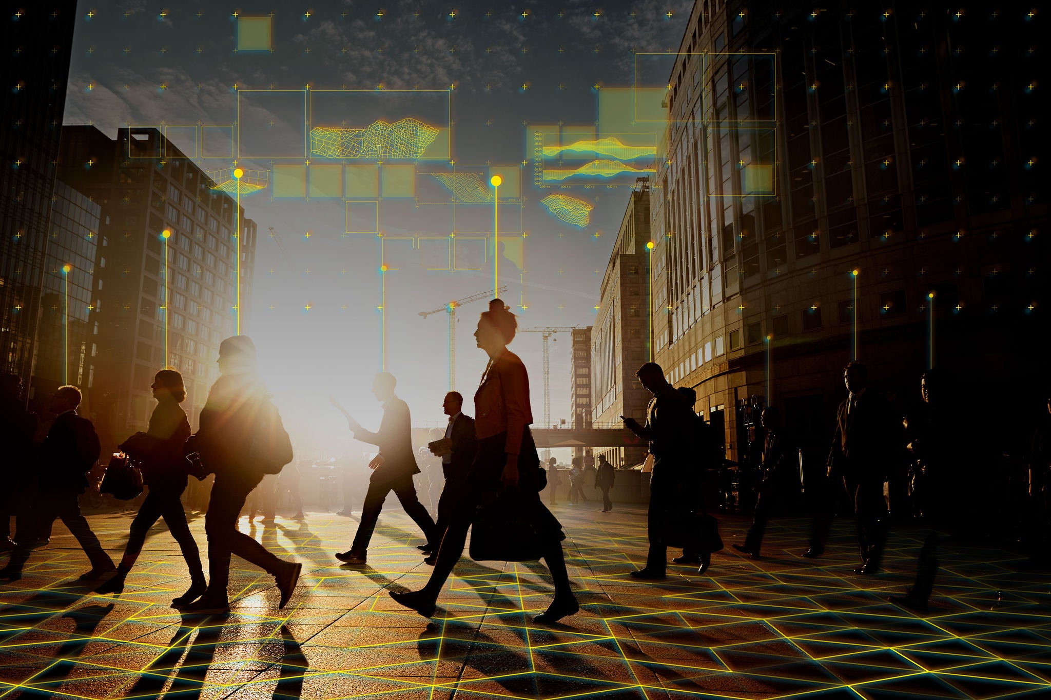 Employees walking to work in the city at sunrise