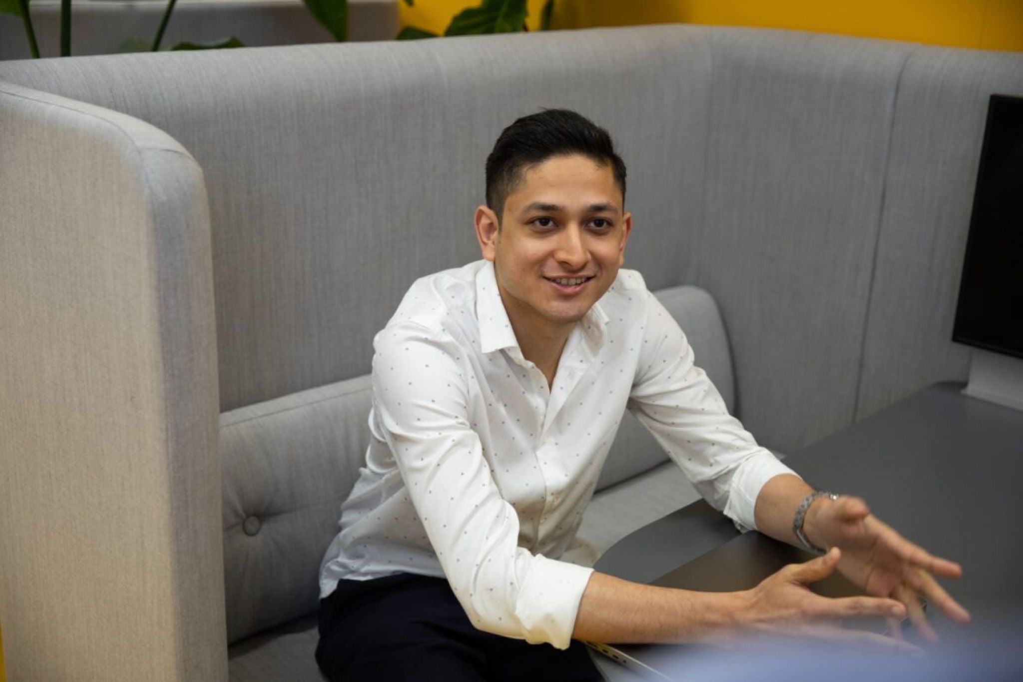 Student sitting in the office couch