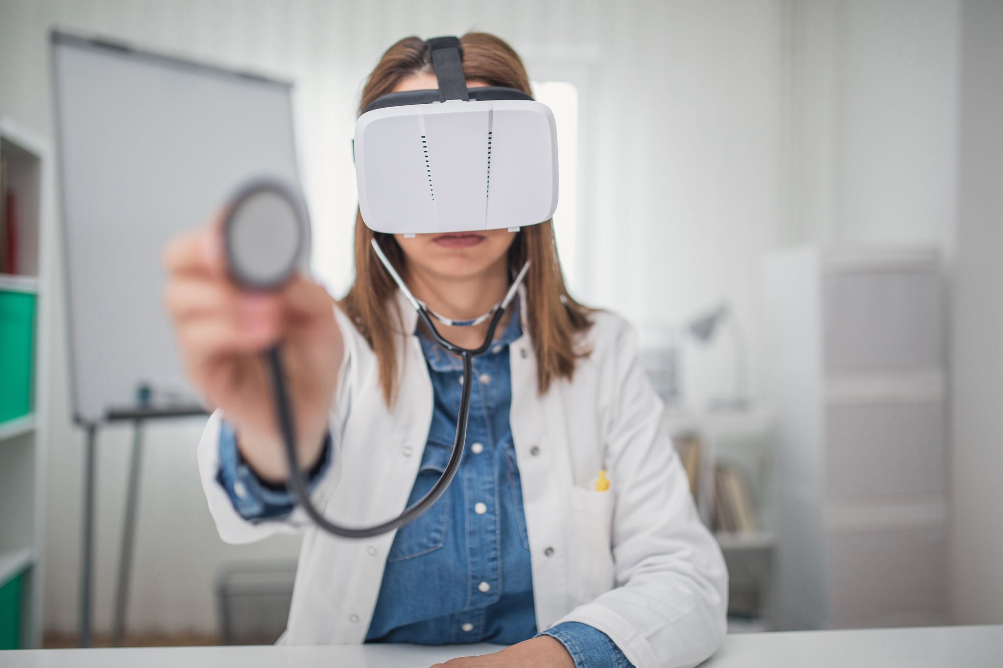 Doctor wearing VR headset