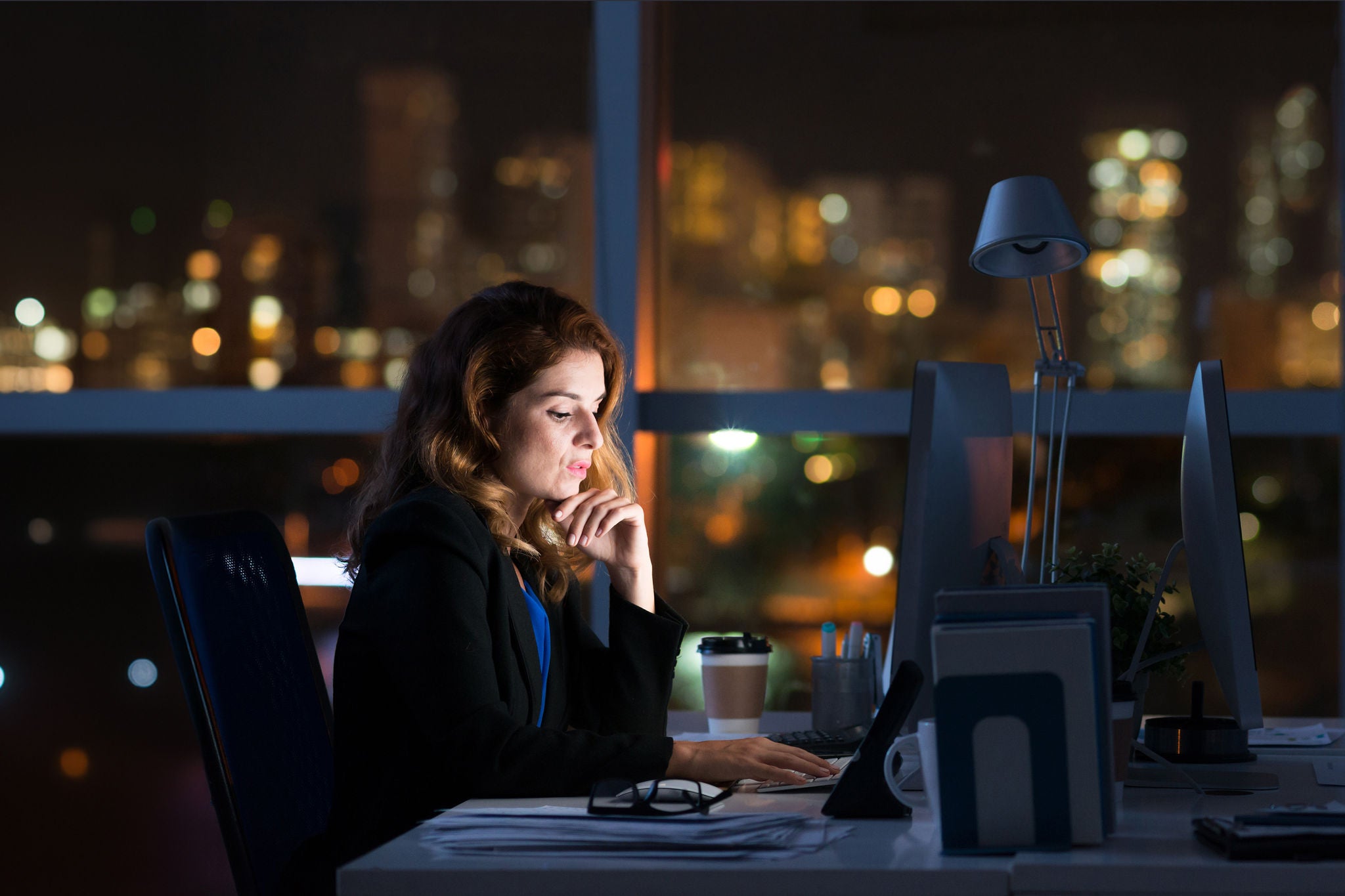 ey female working in office