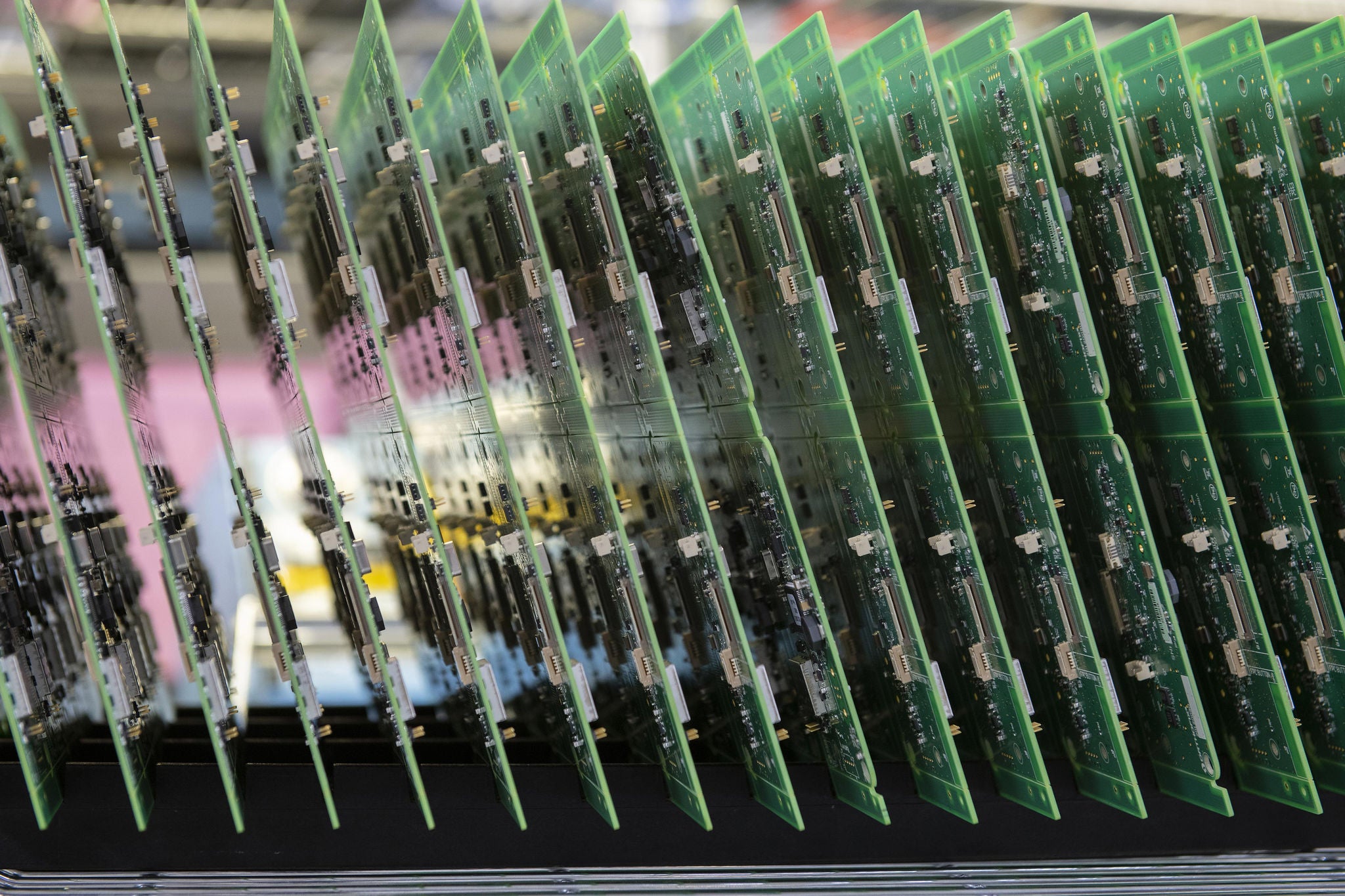 Printed Circuit Boards (PCB) stacked in vertical rack