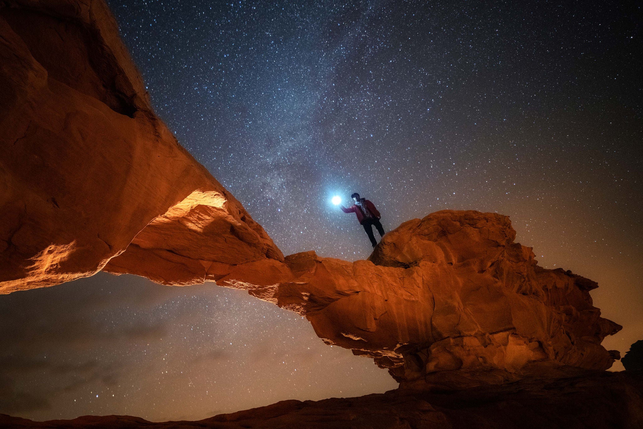 Man lighting on the mountain.